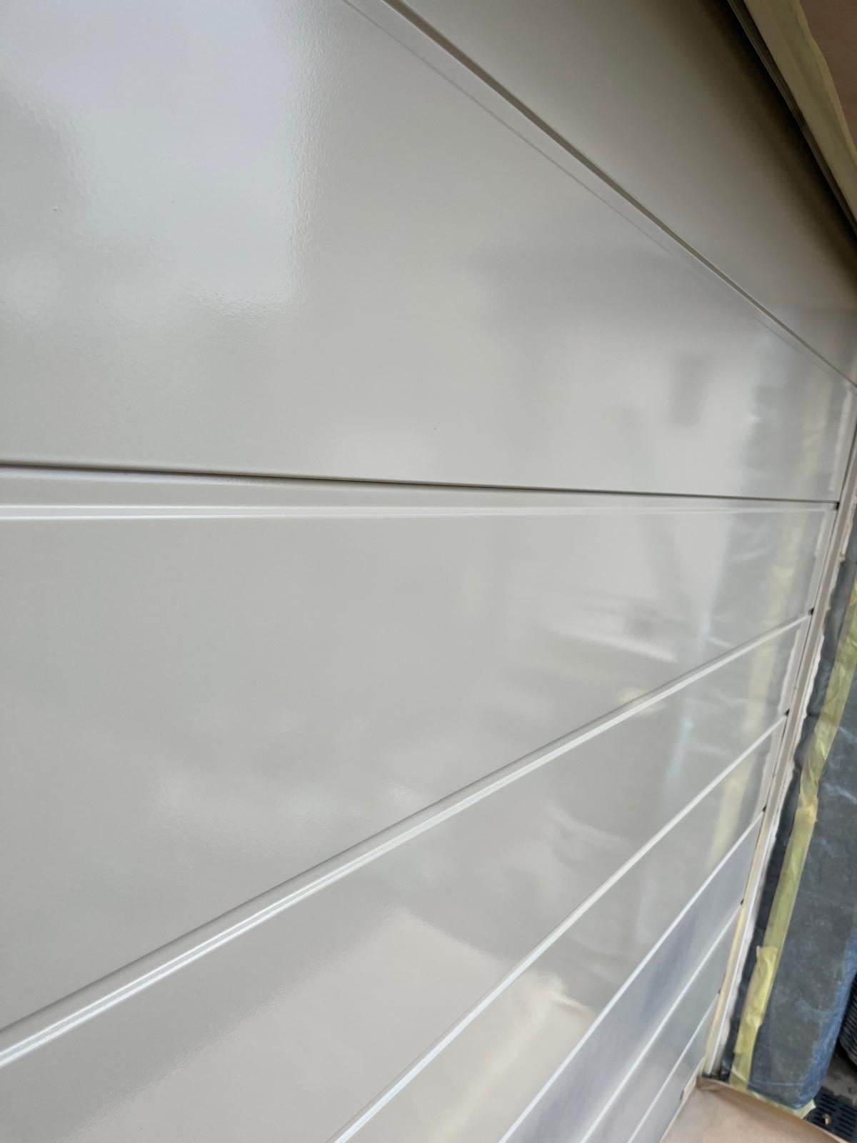 Close up of a satin black sprayed uPVC panel