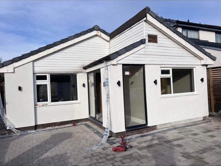 Bungalow with white uPVC fascias, soffits, window frames and doors