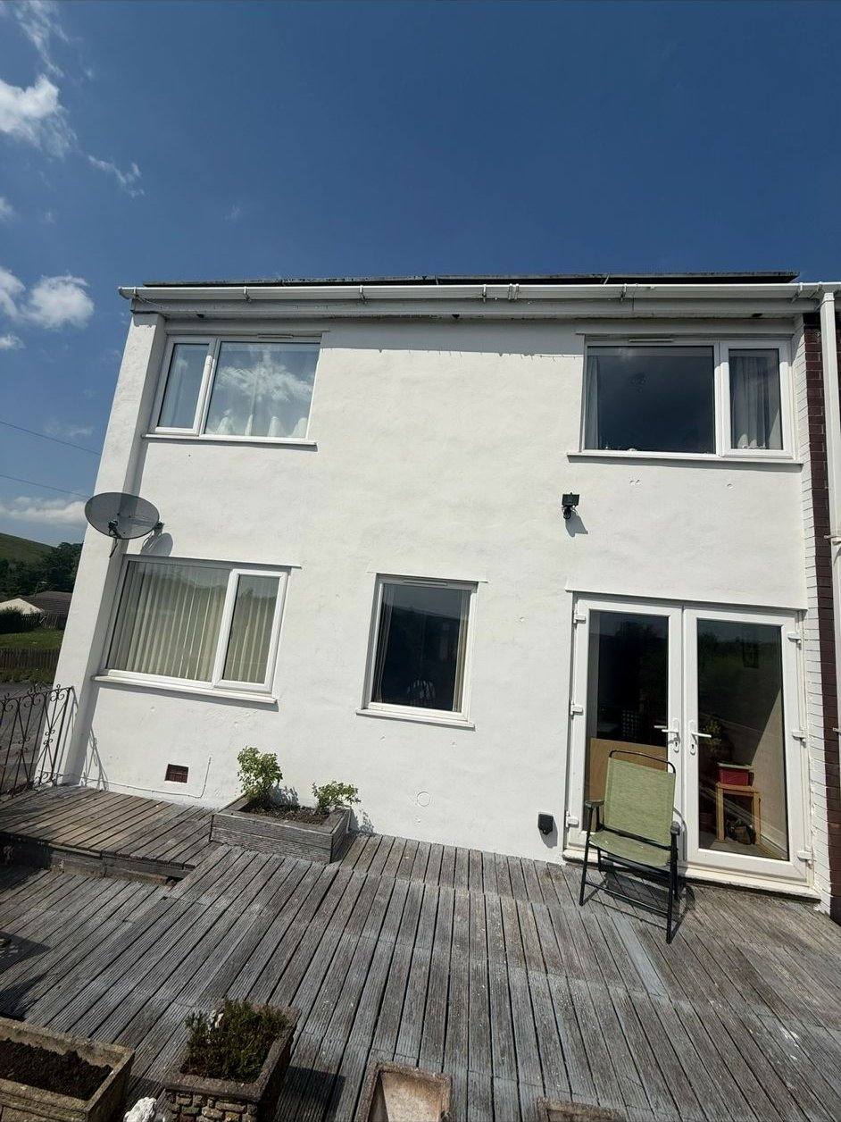 Same rear elevation with fresh bright white render